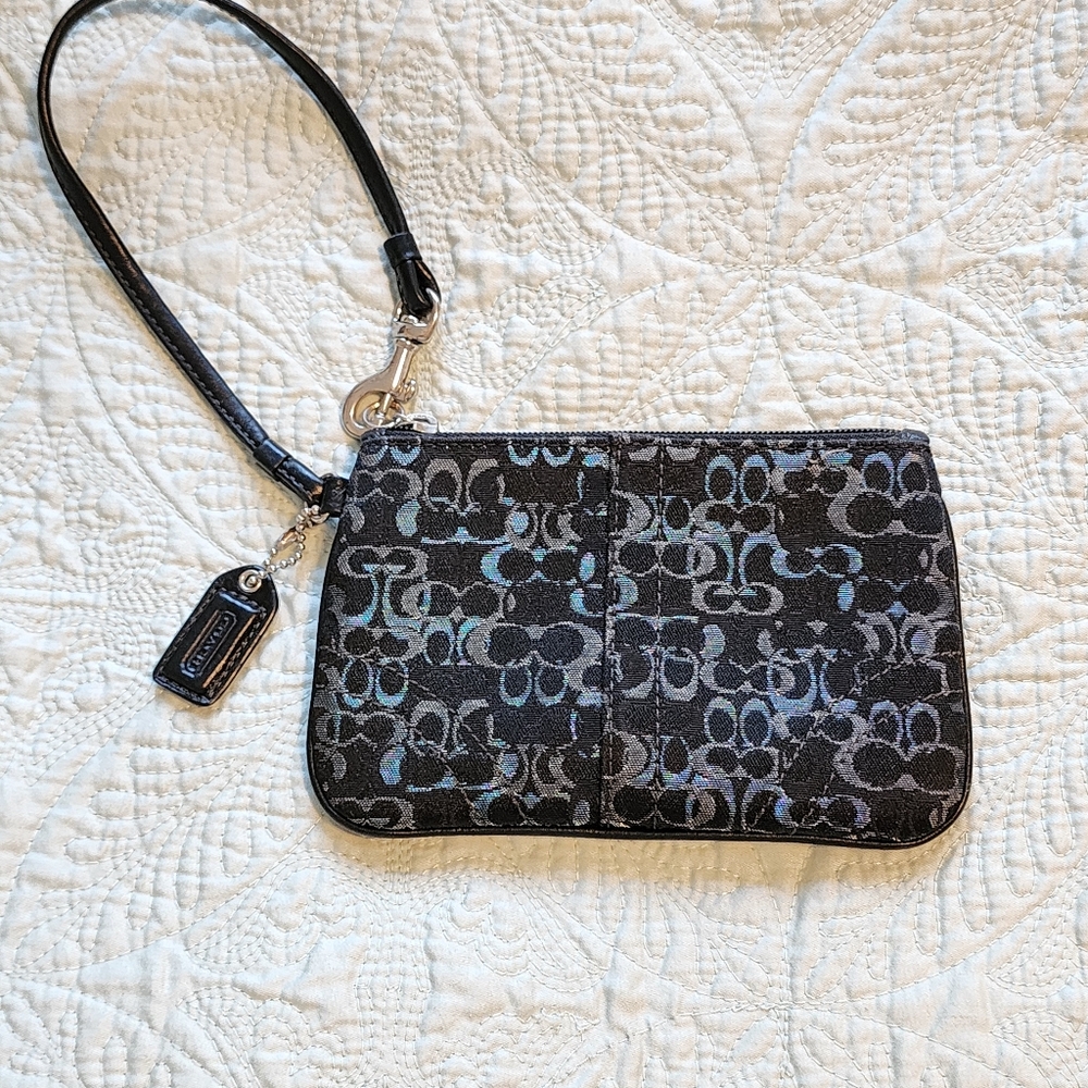 Coach wristlet black Signature canvas with silver and black print